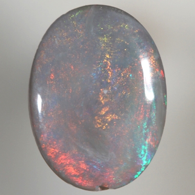 SOLID SEMI BLACK OPAL Bright and rich burning copper orange and fire red over a touch of green blue